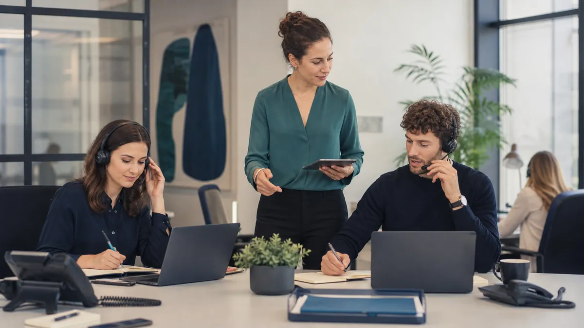 Staffing operations team handling high inbound candidate call volume with organized recruiter follow-up